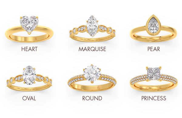 Gold rings with different diamond shapes on a white background