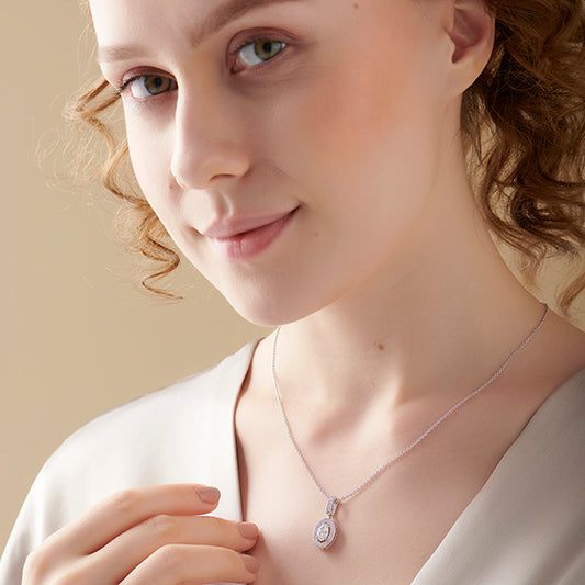 Oval Solitaire with Round Halo Pendant Oval Solitaire with Round Halo Pendant