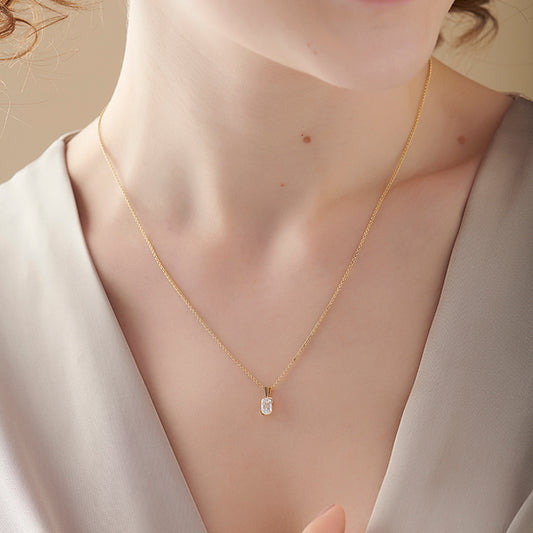 Half Bezel Set Frost Emerald Cut Solitaire Pendant Necklace Half Bezel Set Frost Emerald Cut Solitaire Pendant Necklace