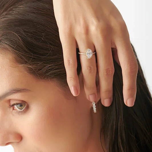 Oval Cut Engagement Ring with Halo Setting Oval Cut Engagement Ring with Halo Setting