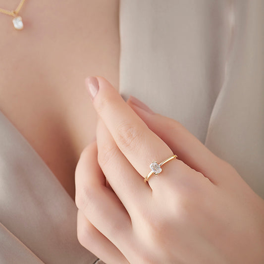 Half Bezel Set Frost Emerald Cut Solitaire Ring Half Bezel Set Frost Emerald Cut Solitaire Ring