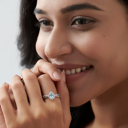 Pear-Shaped Gemstone with Diamond Halo and Accents Ring Pear-Shaped Gemstone with Diamond Halo and Accents Ring