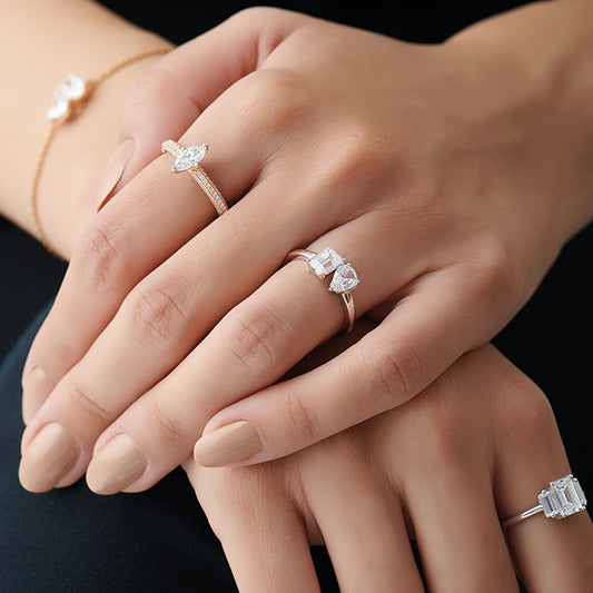 Pear & Emerald-Cut Solitaire Ring Pear & Emerald-Cut Solitaire Ring