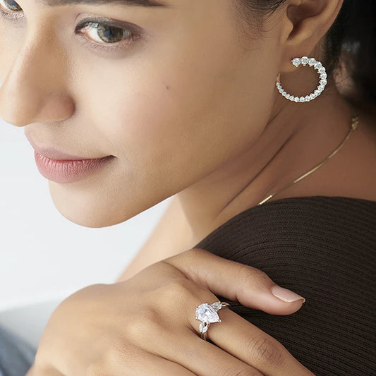 Pear Shaped Solitaire Ring with Marquise Diamond Accents Pear Shaped Solitaire Ring with Marquise Diamond Accents