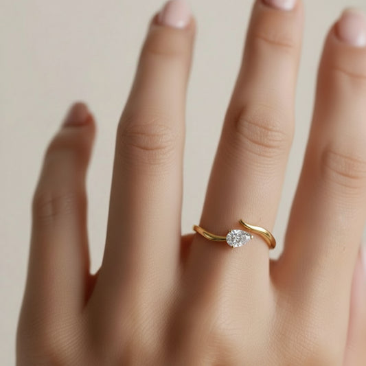 0.30 cts Pear Shape Solitaire Diamond Gap Ring 0.30 cts Pear Shape Solitaire Diamond Gap Ring