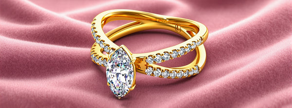 Gold ring with diamonds on a pink fabric background