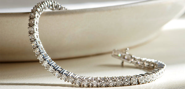 Lab Grown Diamond bracelet with clear stones on a light background Lab Grown Diamond bracelet with clear stones on a light background