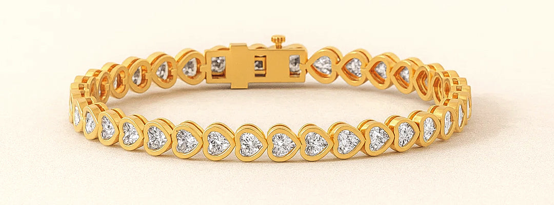Gold bracelet with diamond accents on a beige background