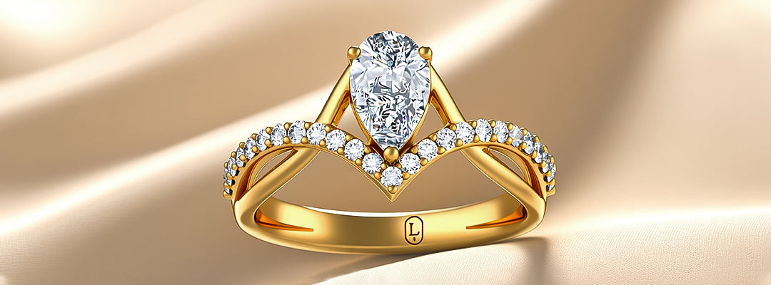 Gold ring with a heart-shaped diamond on a beige background