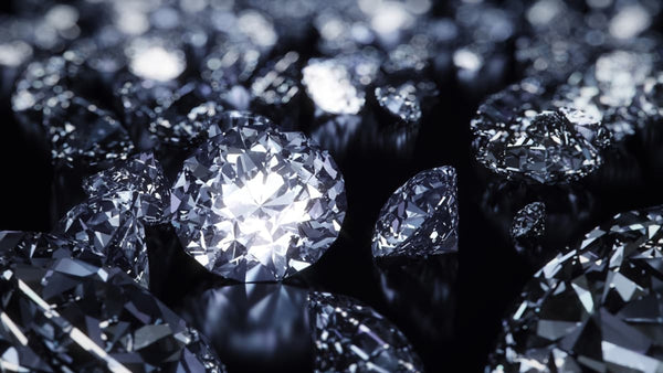 Close-up of diamonds with a dark background