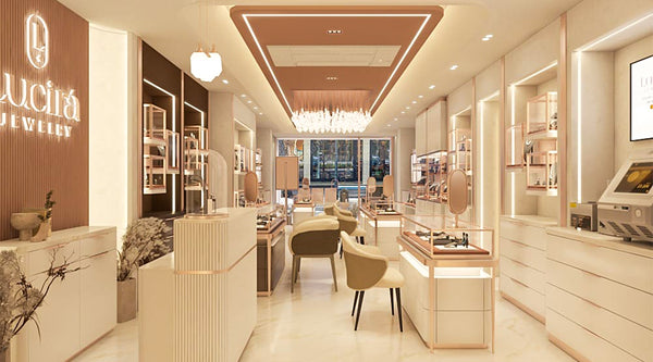 Luxury jewelry store interior of Lucira Jewelry with display cases and seating area.