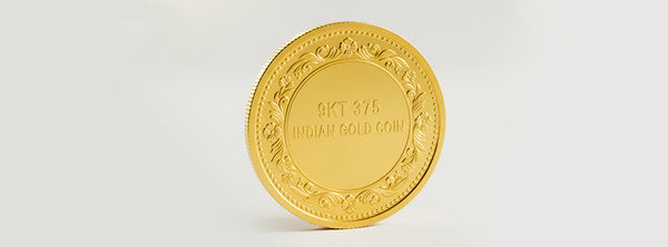 Gold coin with embossed design on a white background