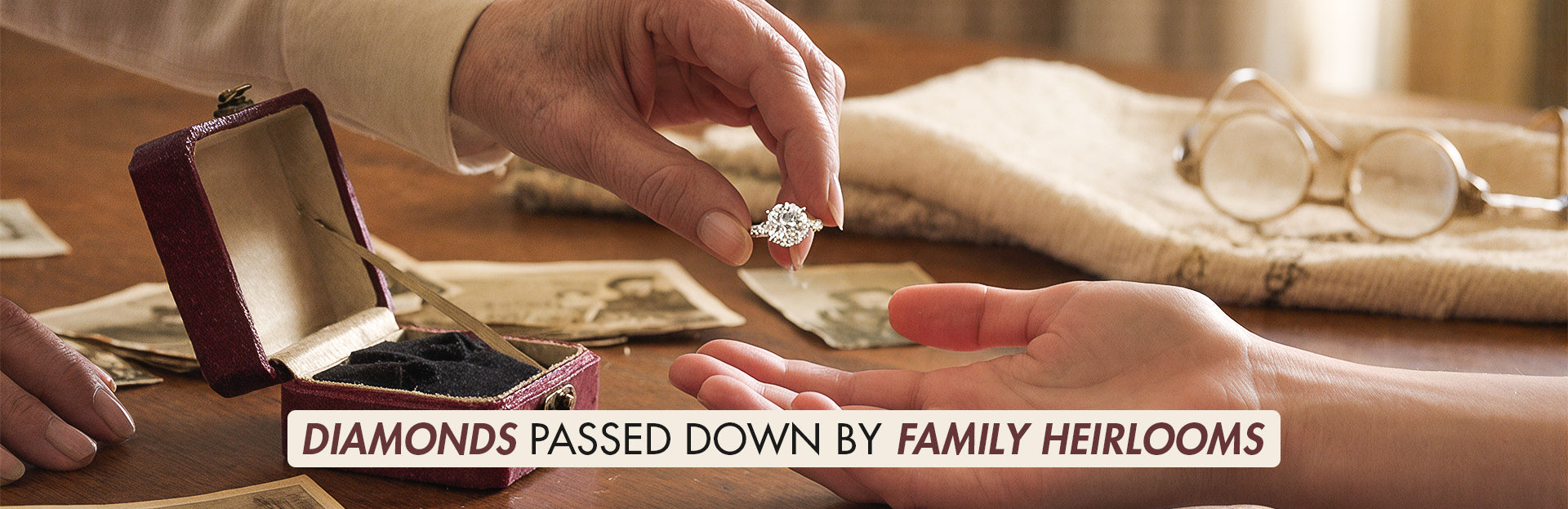 Person holding a diamond ring with a box labeled 'Diamonds Passed Down by Family Heirlooms'.