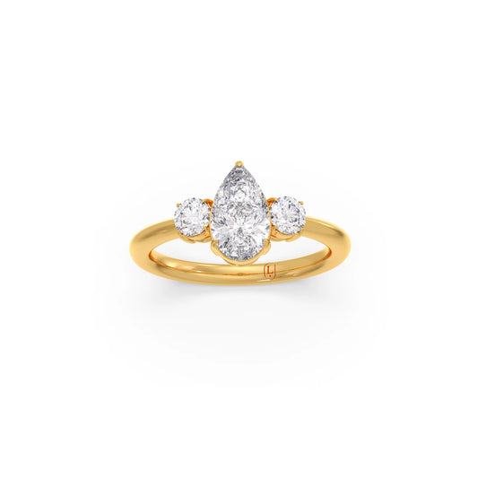 Pear and Round Cut Diamond Trilogy Ring