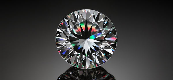 Close-up of a diamond with a black background